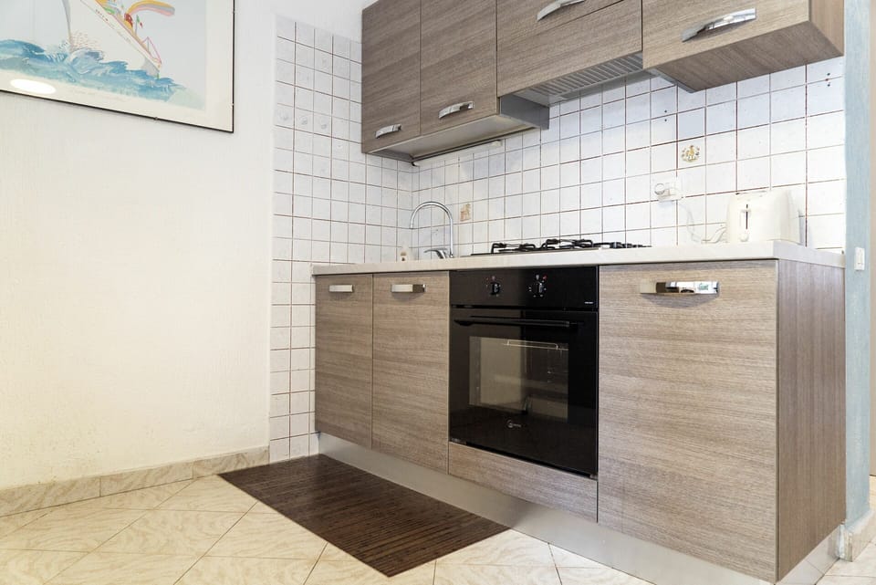 Cabinetry, Property, Tap, Countertop, Sink, Building, Furniture, Plumbing Fixture, Bathroom Cabinet, Interior Design