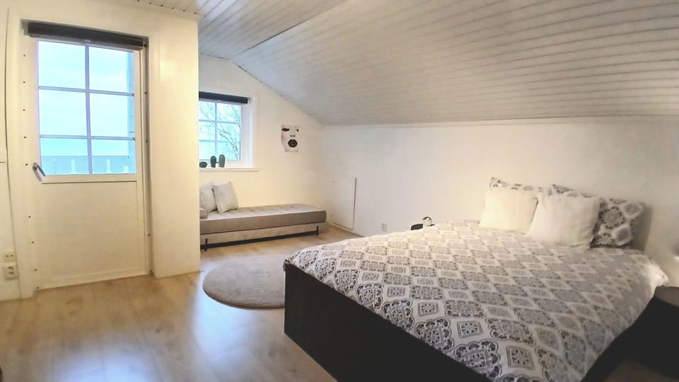 This masterbedroom is spacey and relaxing for a good night sleep.