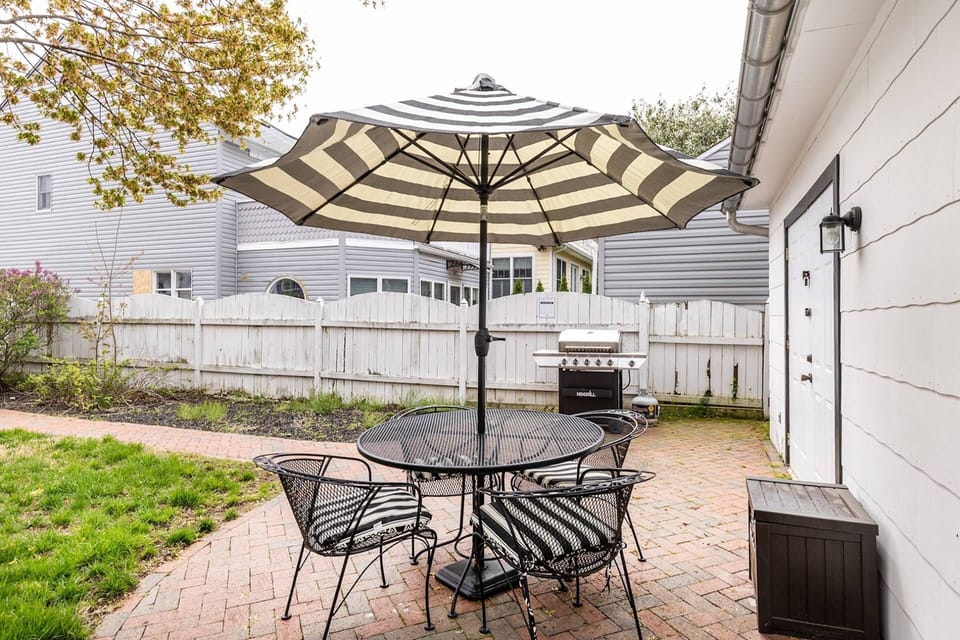 Enjoy a family barbecue in the private fenced-in backyard patio.