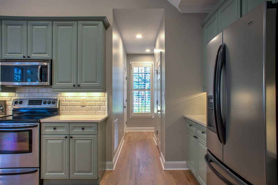 Hallway to Half Bath off of Kitchen