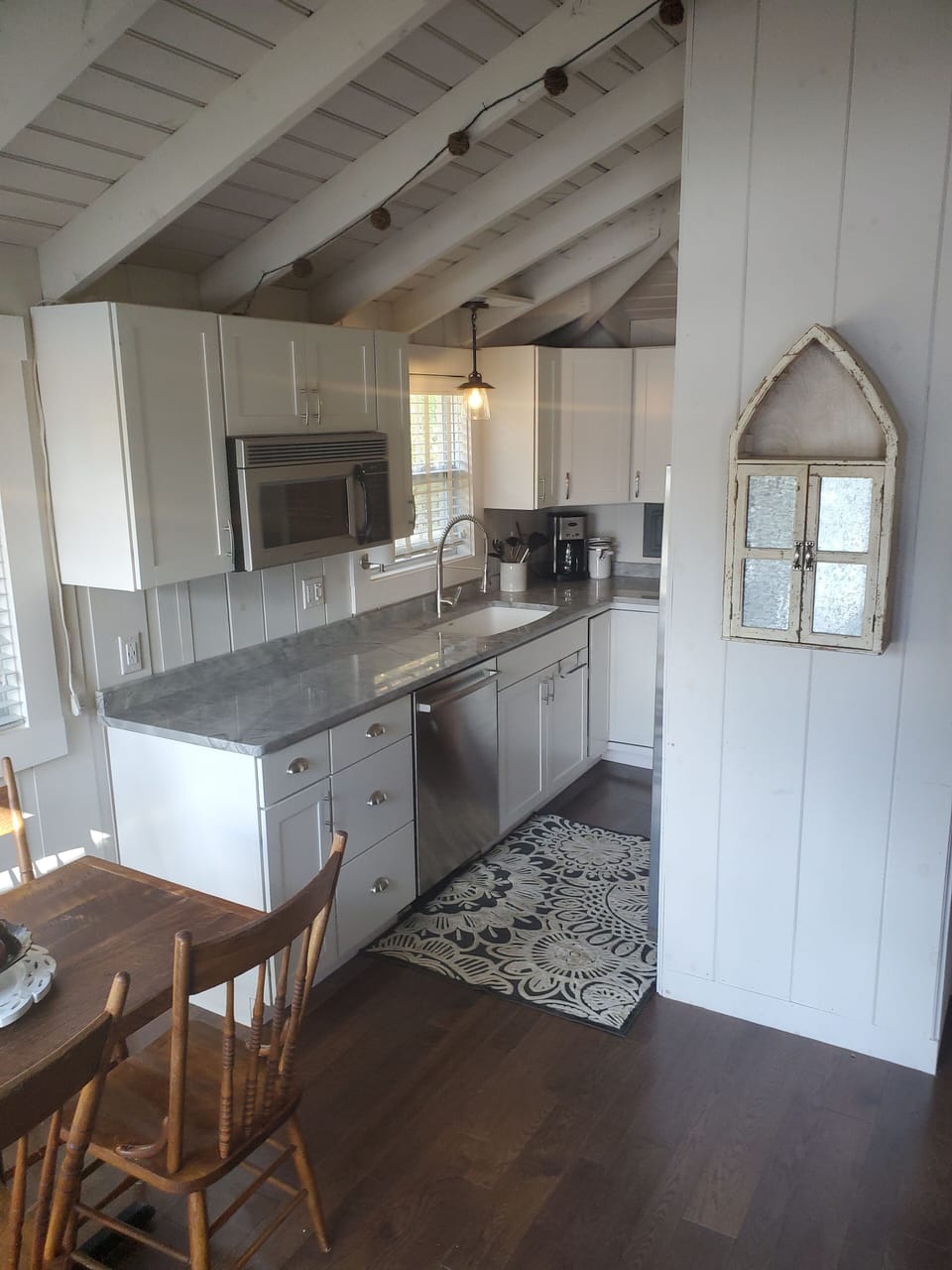 Kitchen -no stove, there is 2 burner hotplate and microbe.  Grill outside.