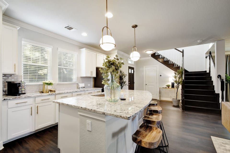 Open kitchen with plenty of room to have all the family around.