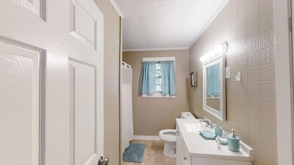full bathroom with bathtub and shower combo