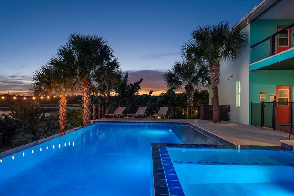 35 foot long infinity pool with sunpad and hot tub.
