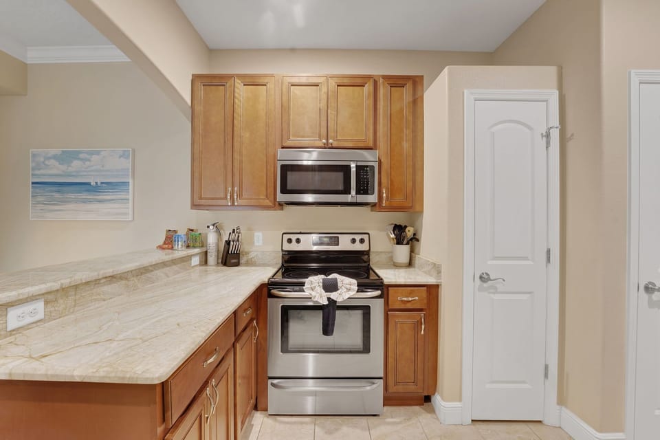 Kitchen is equipped with about everything you'll need to cook and serve a meal.