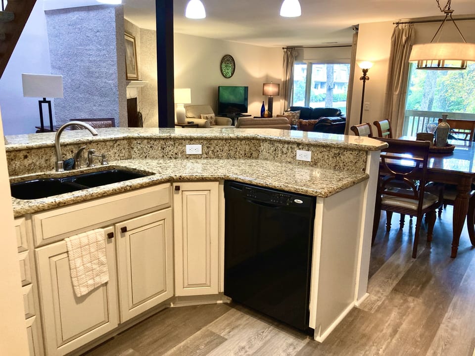 Beautiful updated, well-appointed kitchen -- with a garbage disposal.