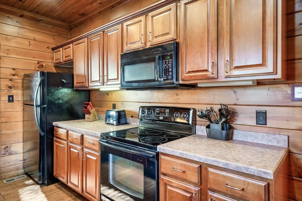 The kitchen is fully stocked with all the dishes, pots, pans, and utensils you will need.  We even have plastic dishes, cups, and utensils for kids and a crock pot to make large meals for everyone.