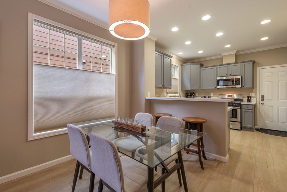 Dining &Kitchen. Dining table for 6 w/ bench from entry, 2 at counter, 8 total.
