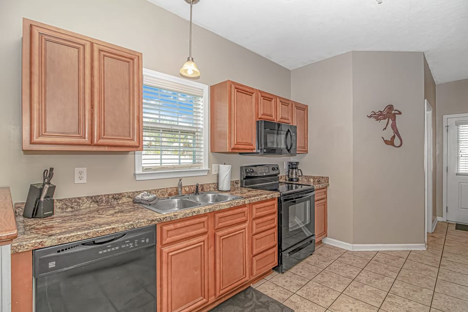 Contemporary kitchen with a sleek design and state-of-the-art appliances.