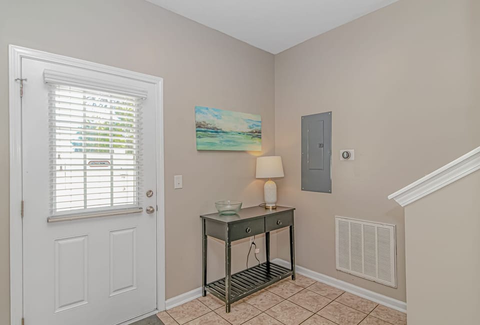 The back hallway provides quick access to the outdoor area.