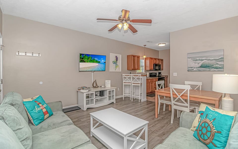 The living and dining rooms are perfect for family gatherings and guests.