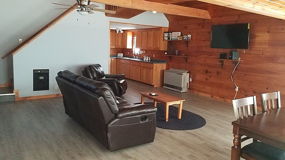 New vinyl plank floor helps keep the place neat and comfortable. 