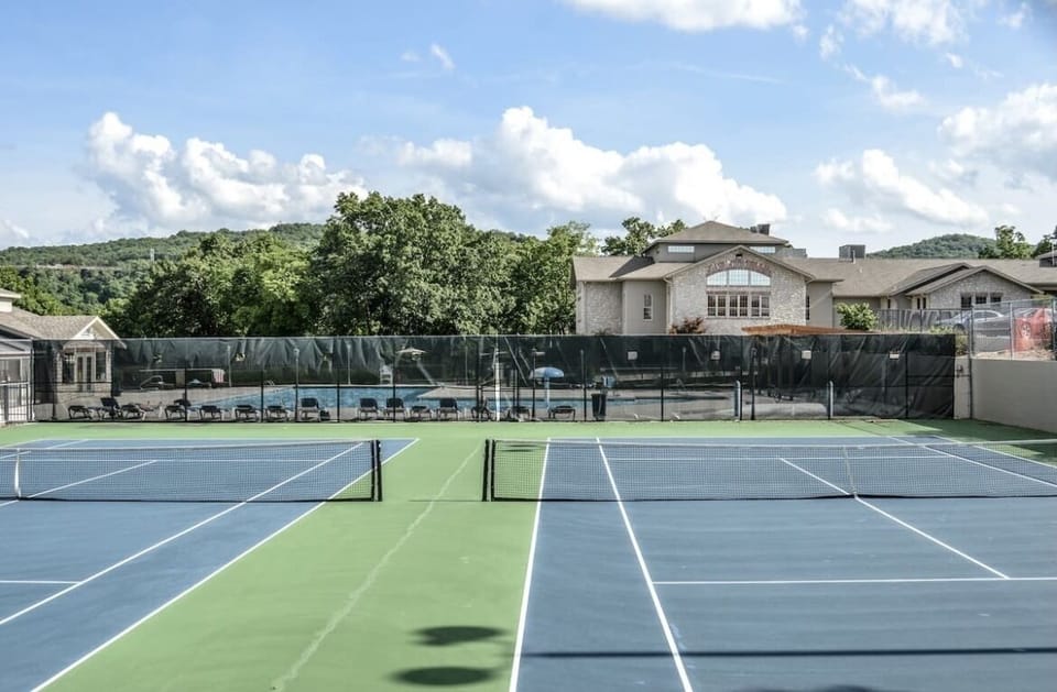 Lighted tennis and basketball courts within walking distance of the unit.  