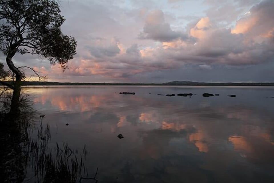 Sunset - mirrored clouds over lake