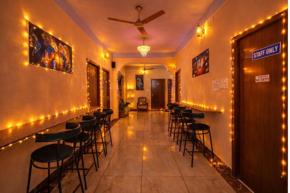 Deluxe Double Room | Living area | 32-inch LCD TV with cable channels, TV
