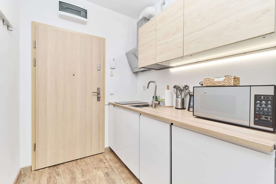 The kitchenette's practical layout maximizes space and functionality.