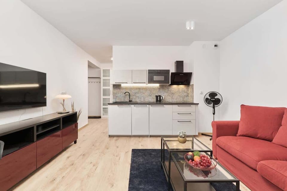 Use the flat-screen television in the elegant living area.