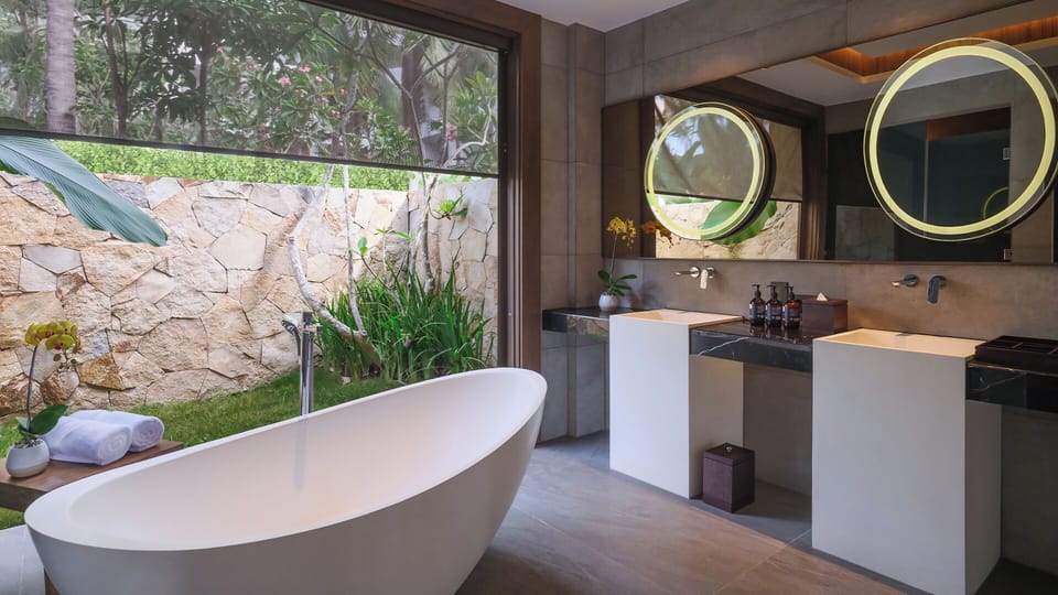 Villa, 1 Bedroom, Private Pool, Garden Area | Bathroom | Separate tub and shower, eco-friendly toiletries, hair dryer, bathrobes