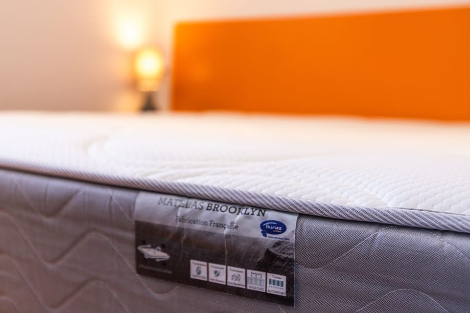 Down comforters, desk, blackout drapes, soundproofing