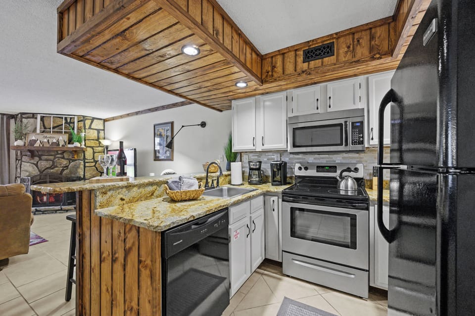Whether you're just having wine & cheese, or preparing a full meal, the kitchen has what you need.  The full size refrigerator and stove, great selection of pans and all the plates, glasses and utensils you'll need.  It's all here for you!