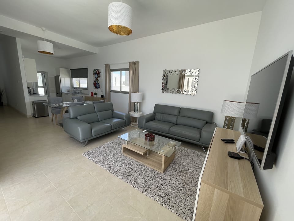 Living area with view of pool