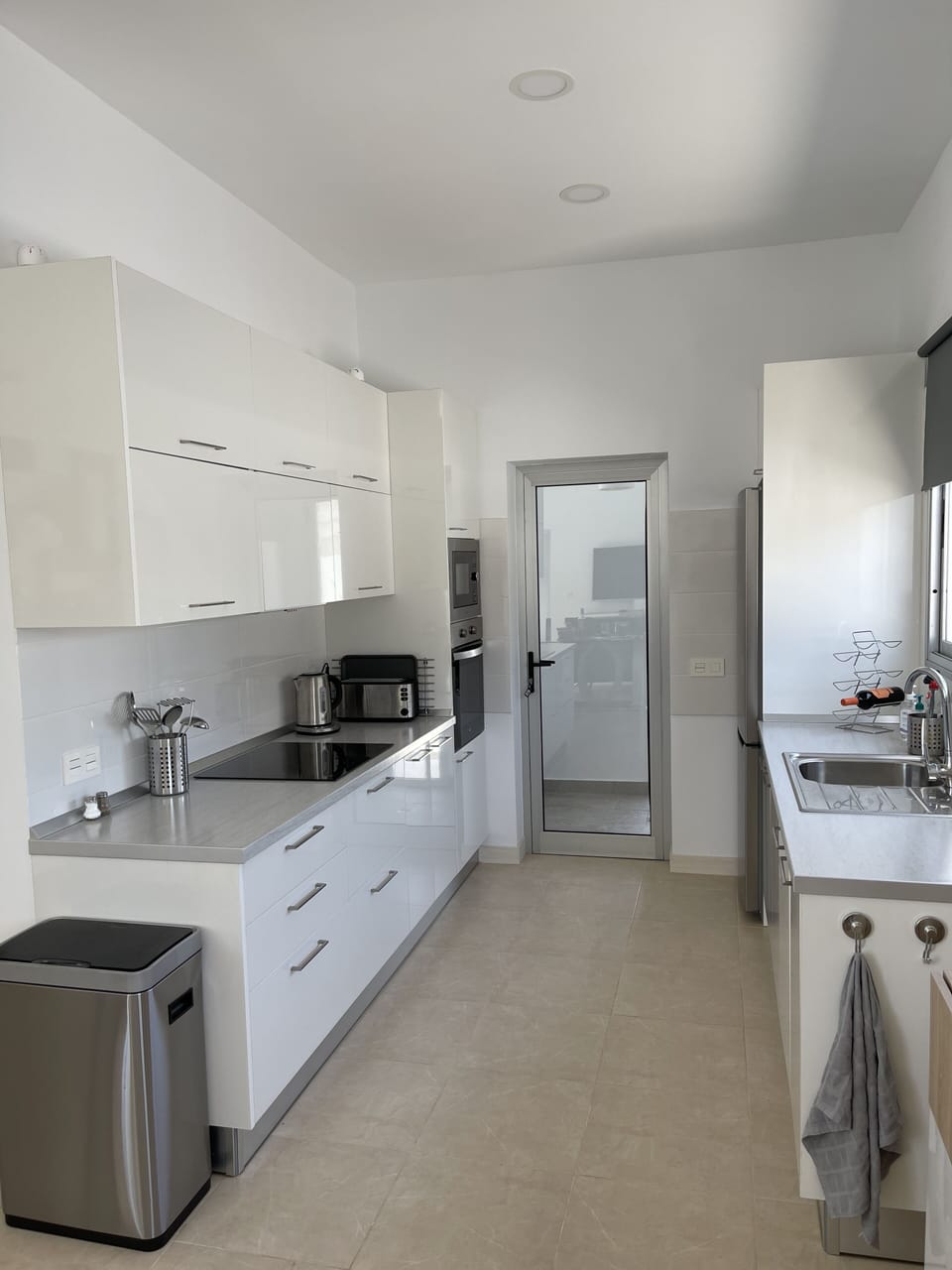 Kitchen - fully equipped, leads to separate utility 