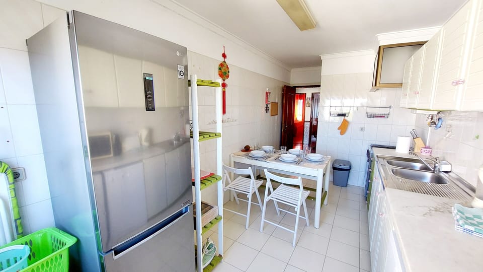 The kitchen is very wide with all amenities