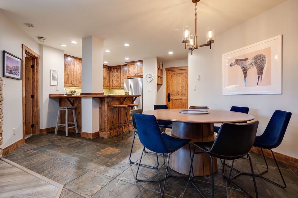 Gather around your stylish dining table for memorable meals, with a fully equipped kitchen ready for culinary adventures.