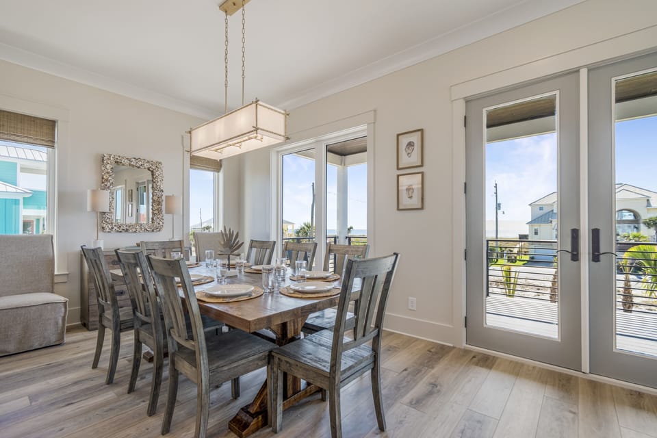 French doors lead out to the Gulf view balcony
