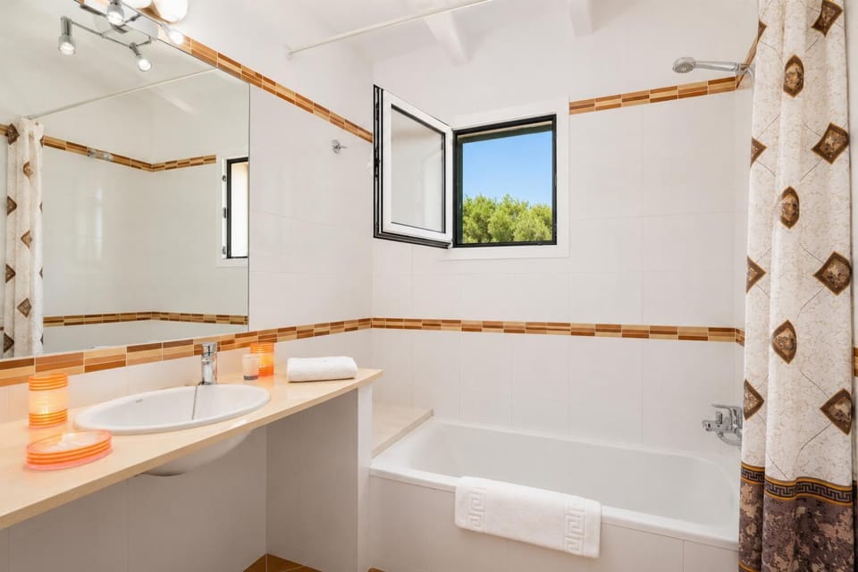 Family bathroom with bath and shower