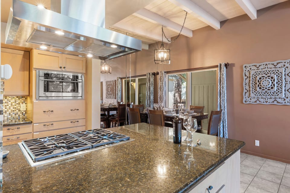Kitchen island for preparing a gourmet meal or mixing cocktails