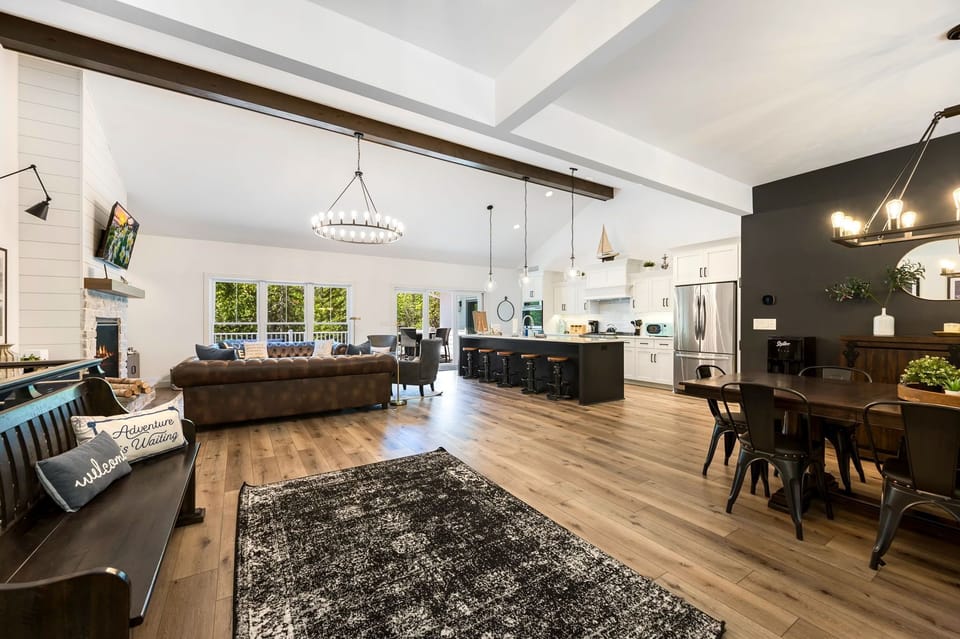 Create lasting memories gathered around the dining room table, or in the open  living area on the main level, perfect for cherished traditional family meals or lively games.