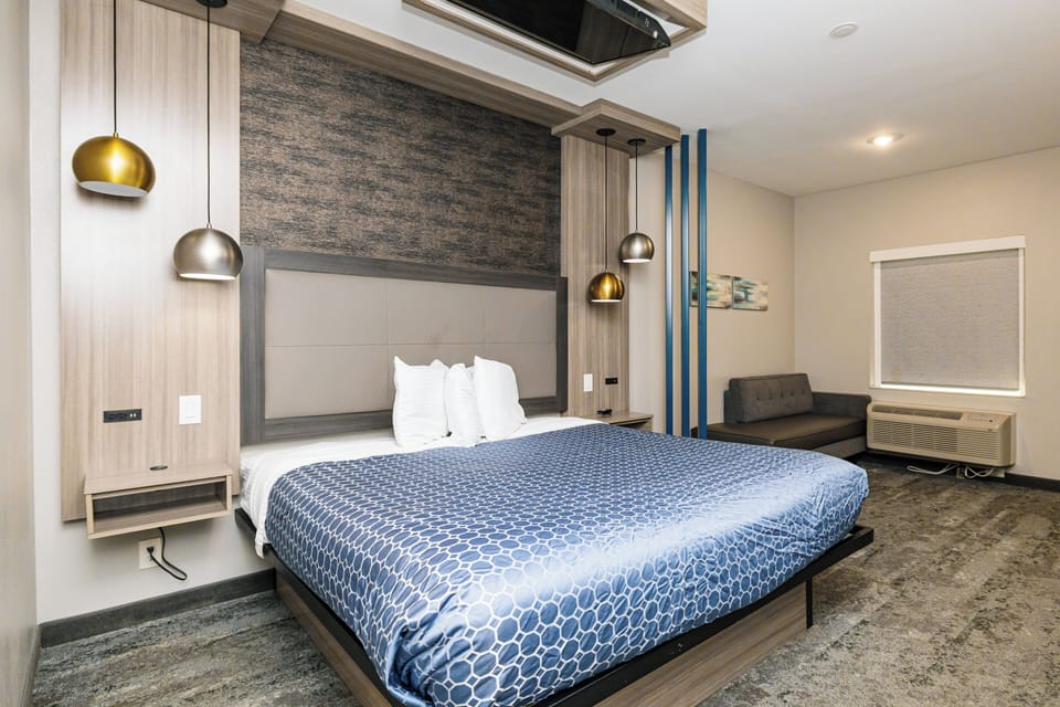 Premium bedding, down comforters, desk, laptop workspace