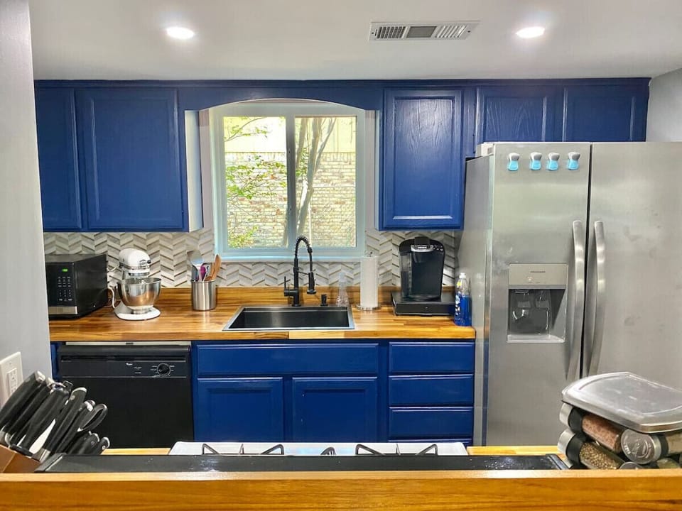 Beautiful blue cabinetry in the kitchen