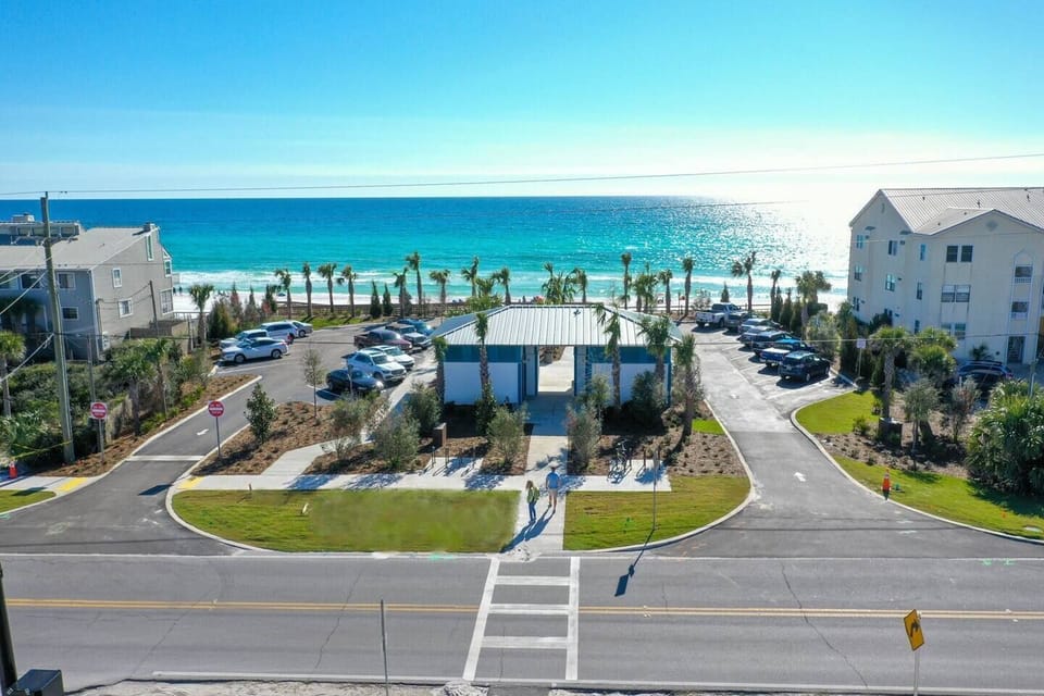Dune Allen Beach Access at front of neighborhood. Parking, restrooms, shower, ramp and stairs to beach.