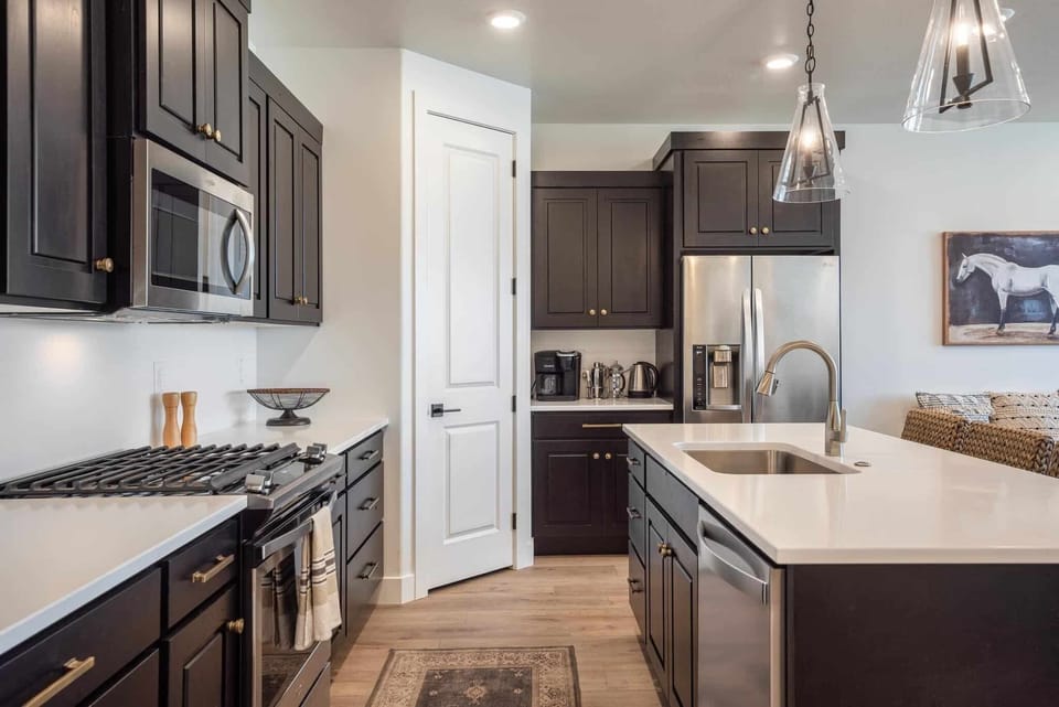Townhome, 4 Bedrooms | Private kitchen | Fridge, oven, coffee/tea maker, electric kettle