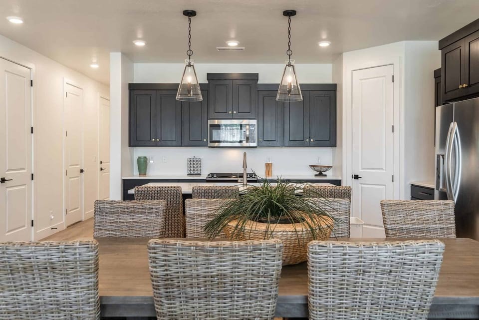 Townhome, 4 Bedrooms | Private kitchen | Fridge, oven, coffee/tea maker, electric kettle