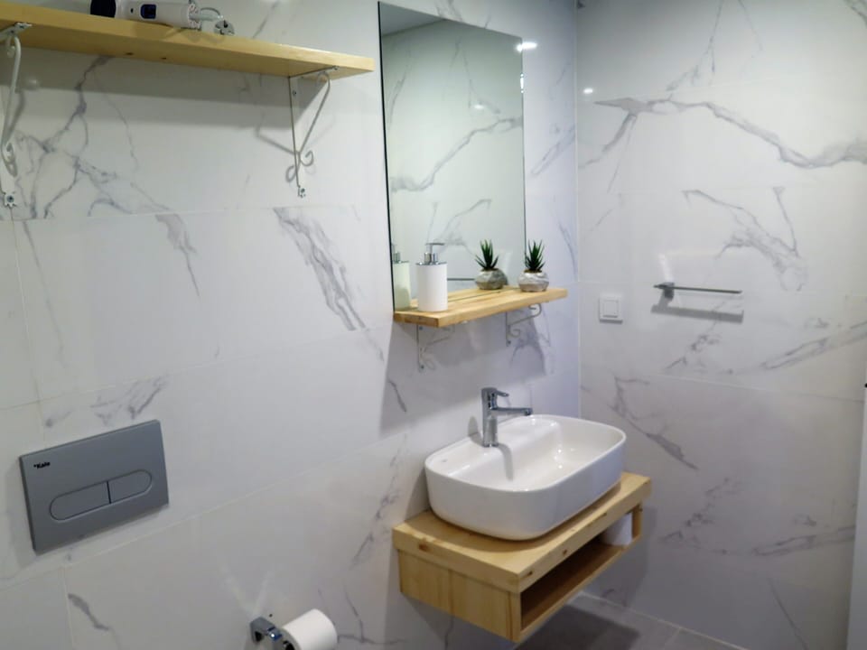 Apartment, 1 Queen Bed with Sofa bed | Bathroom | Shower, free toiletries, hair dryer, slippers