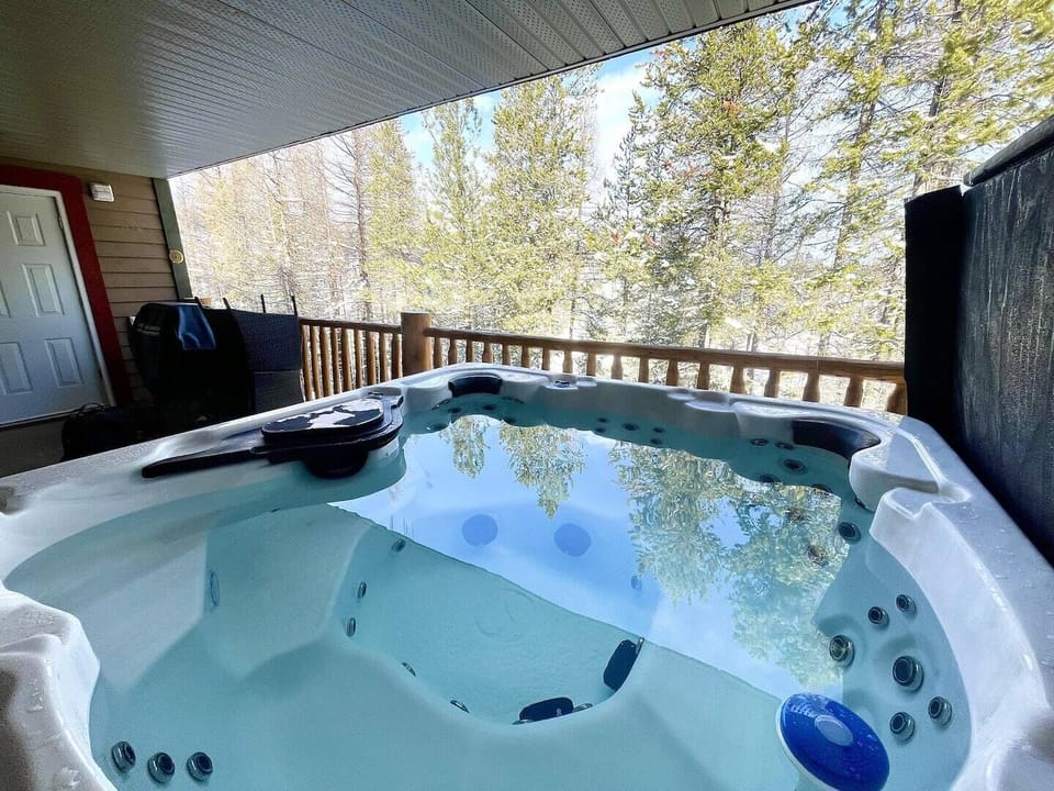 Relax and soak tired muscles in the private hot tub!