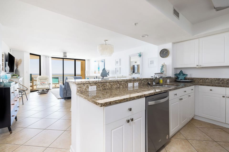 Your spacious kitchen flows seamlessly into the living area