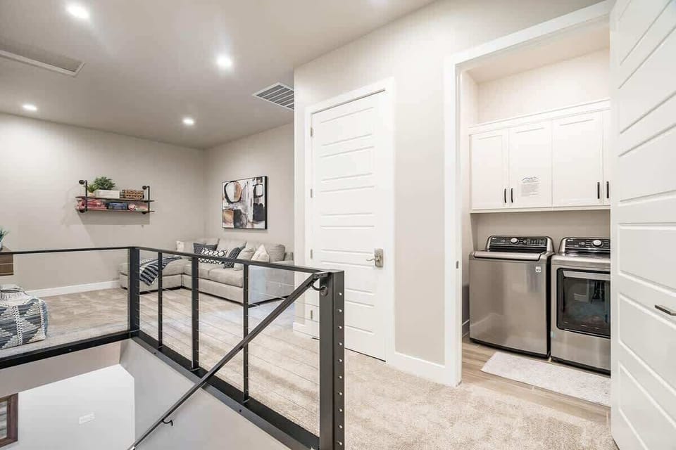 Upper floor family room and laundry room