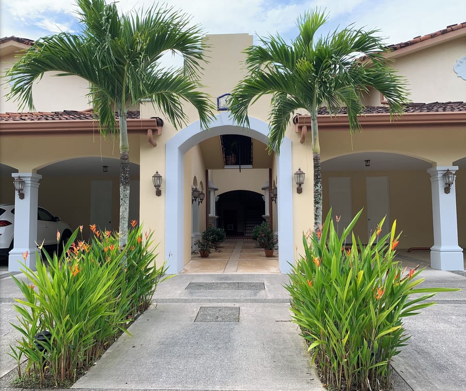 Outside of your Condo (on ground level ⬆️ ahead) and parking spot (to the ⬅️)