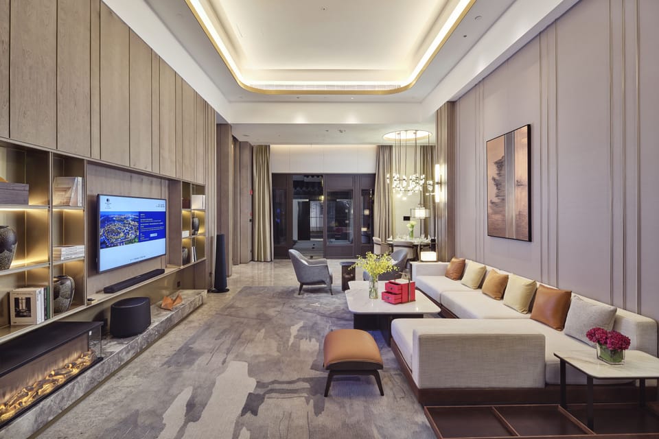 Presidential Villa, 1 King Bed | Living room | 65-inch LCD TV with cable channels, TV