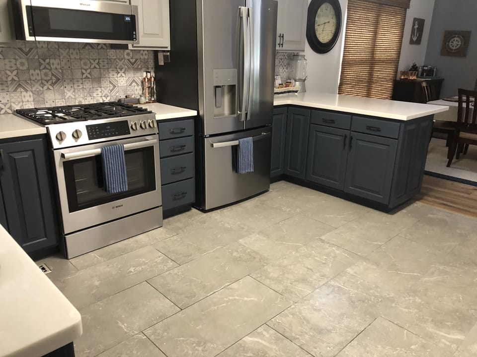 Newly remodeled kitchen. Stainless appliances, gas cooktop, electric oven. 
