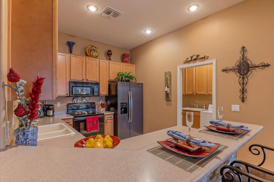 The laundry room is adjacent to the kitchen.