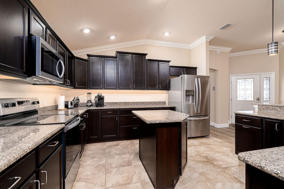 Plenty of cabinet space, plus walk-in pantry in hallway
