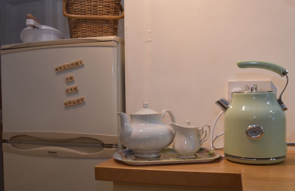 Comfort Cottage | Private kitchen | Highchair