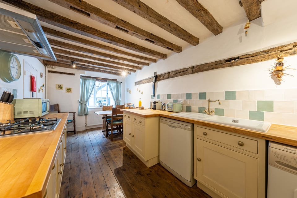 Comfort Cottage | Private kitchen | Highchair