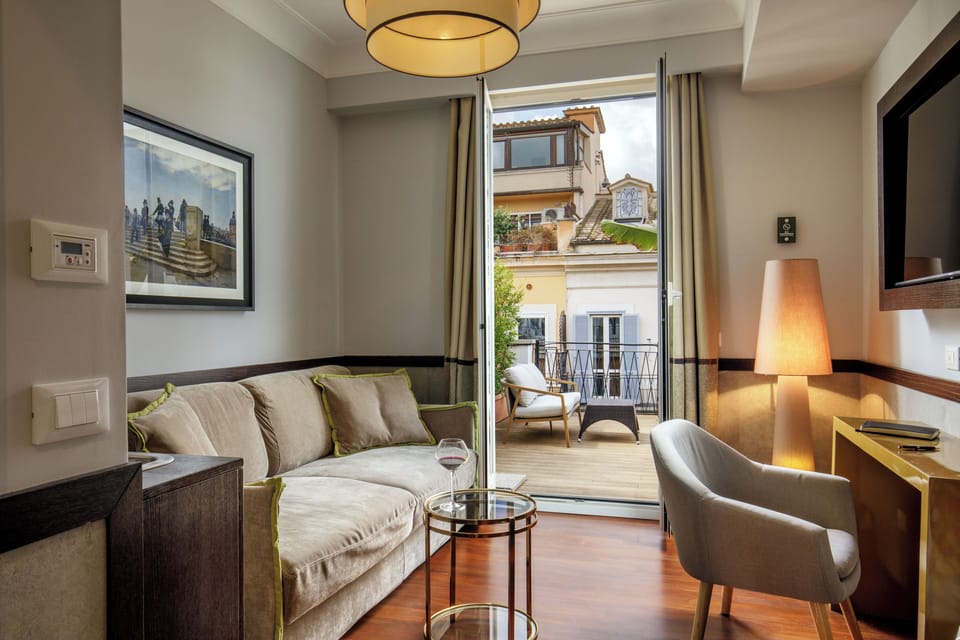 Suite, Terrace | Living area | 32-inch flat-screen TV with satellite channels, TV