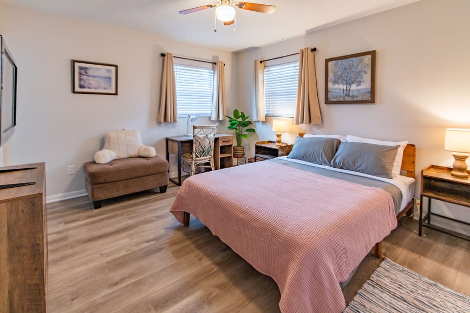 tv, dresser, desk/chair, private bathroom, spacey closet